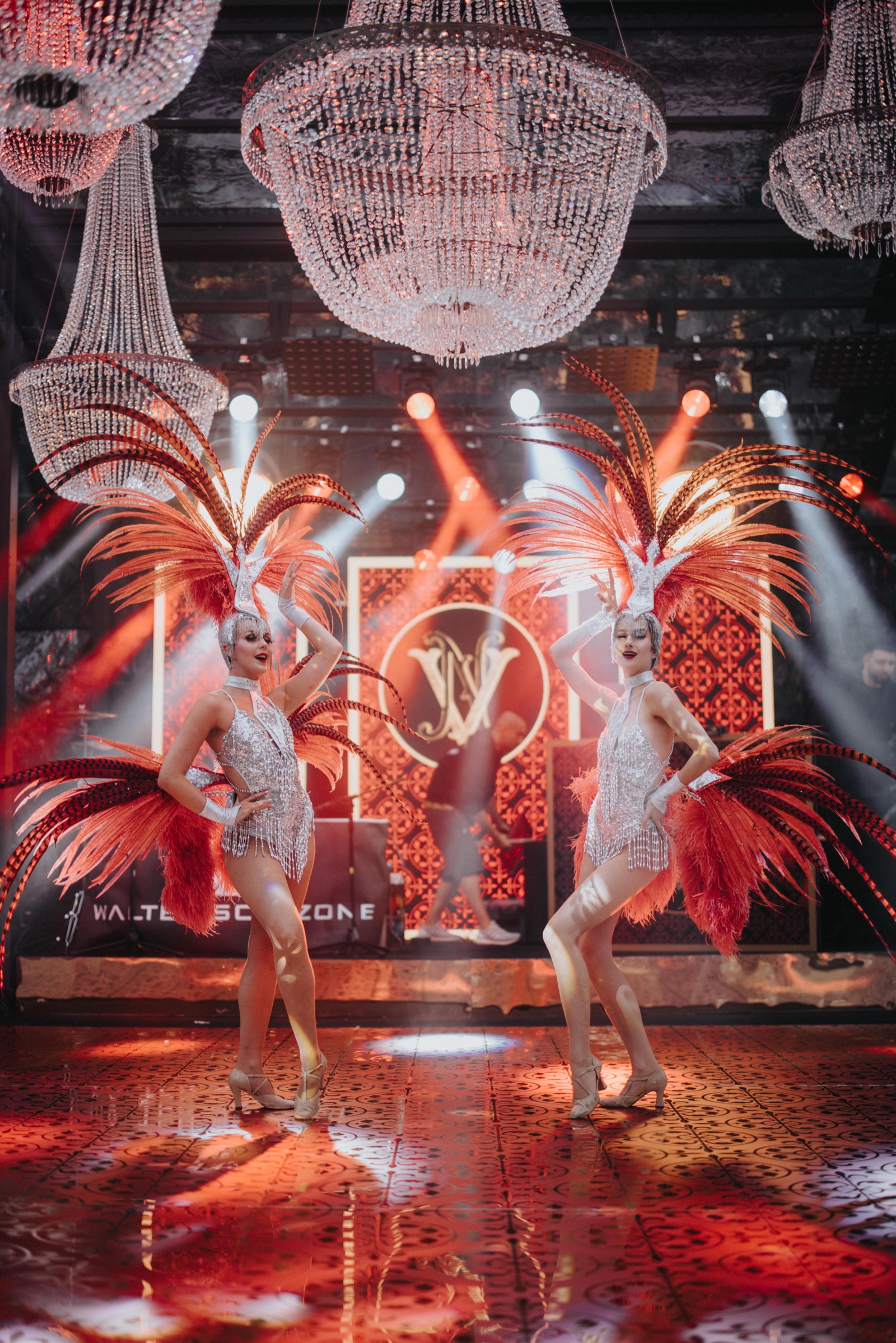 Showgirl performers dancing at a wedding celebration event