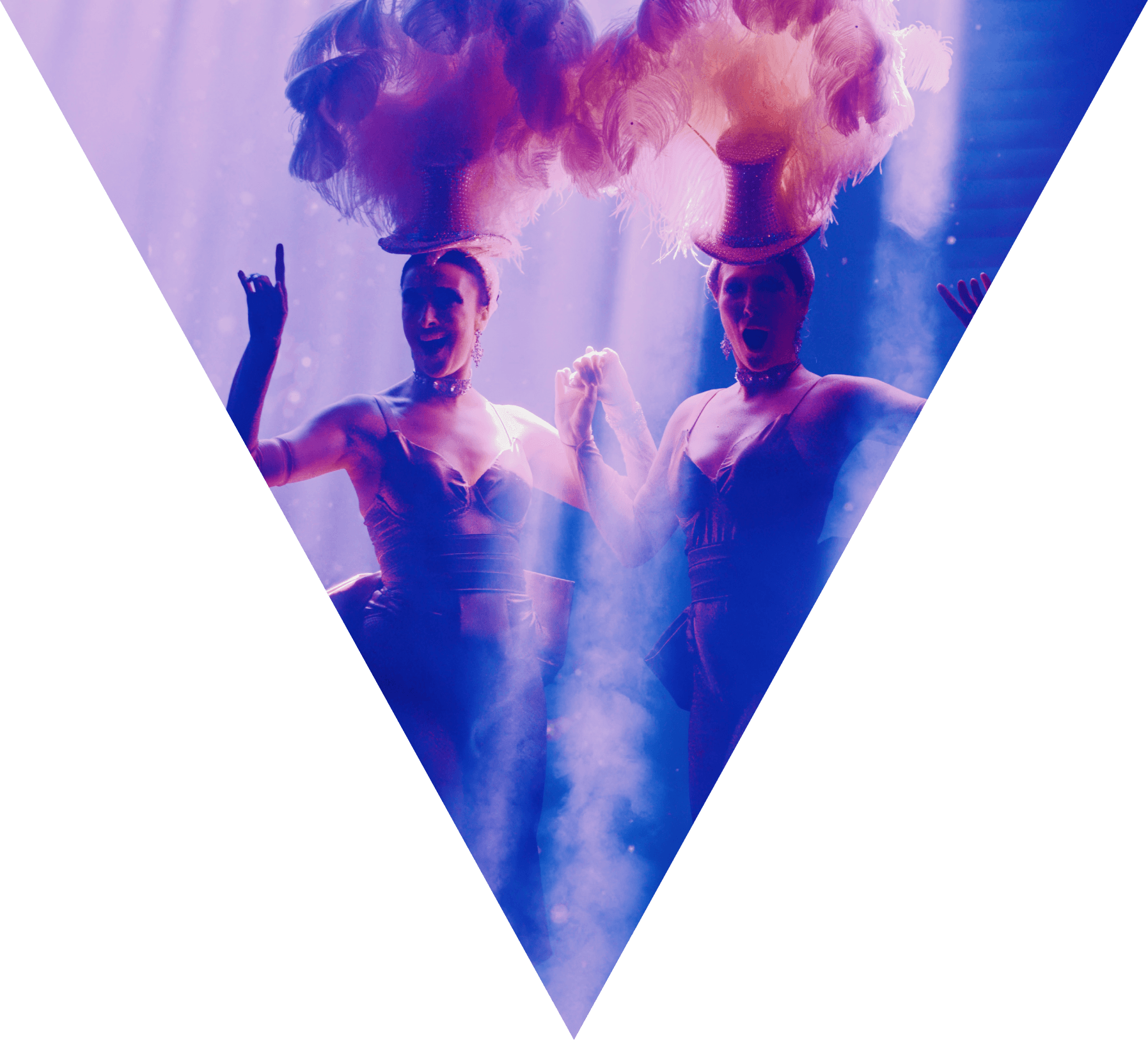 Two showgirl performers dancing on stage