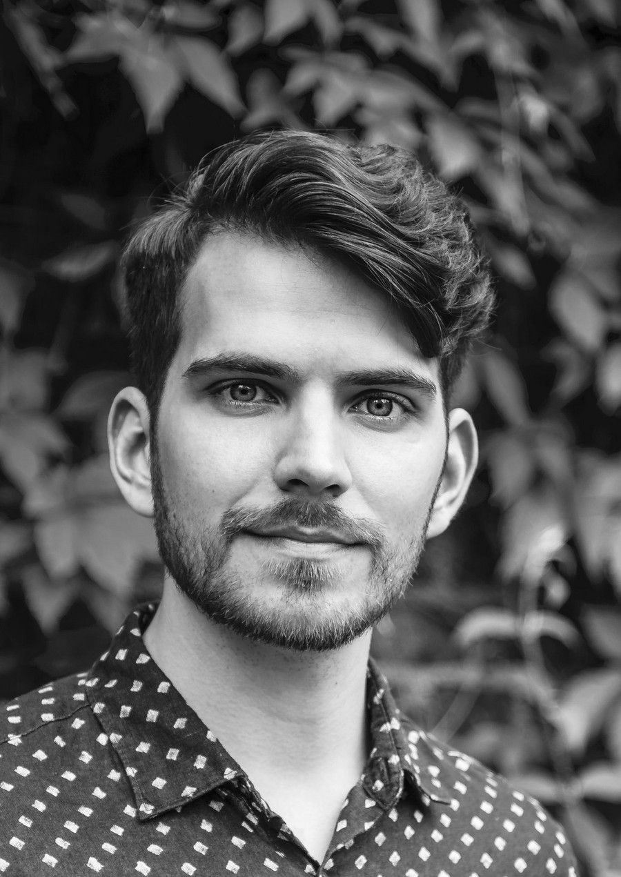 A black and white portrait photography of Jari Laakso, the director of Revudeville Proudctions
