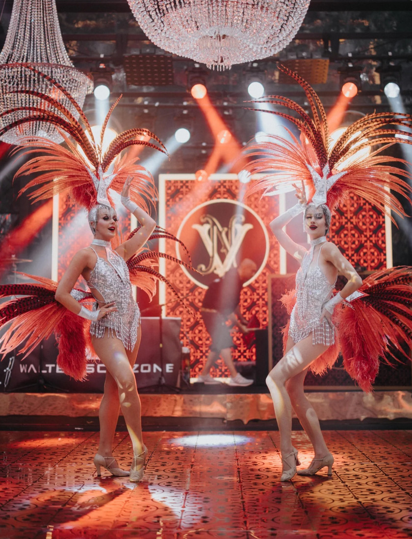 Showgirl performers dancing at an event